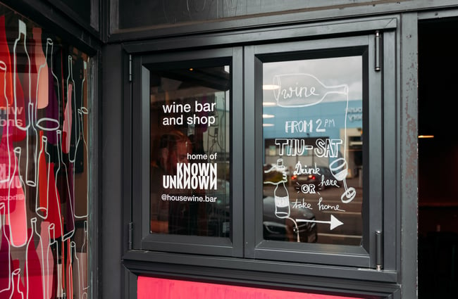 A small window on the exterior of a New Plymouth wine bar.
