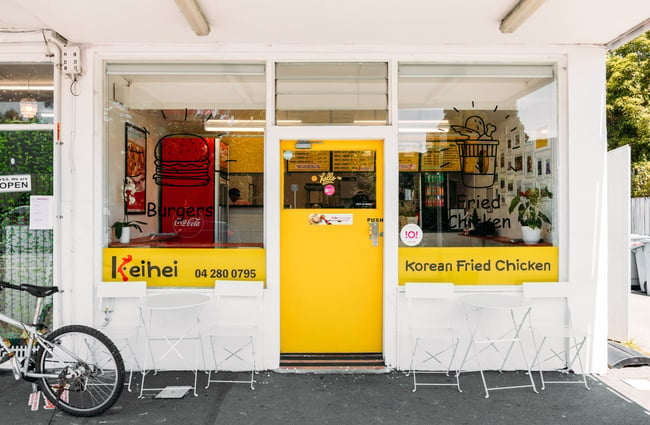 The yellow and white exterior of Keihei Chicken in Upper Hutt.