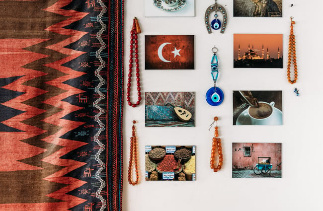 Turkish postcards and colourful beads on wall