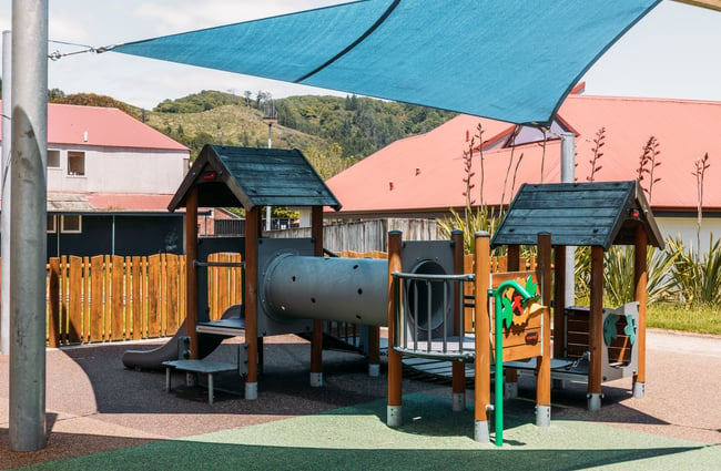 A covered outdoor playground area.