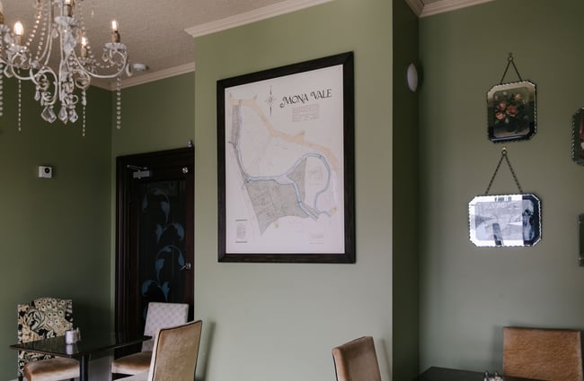 Map of Mona Vale framed on the wall.