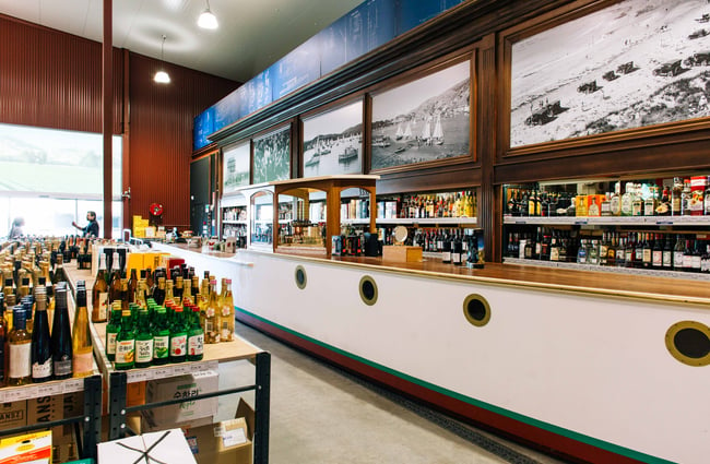 Old boat wine counter at Moore Wilson's.