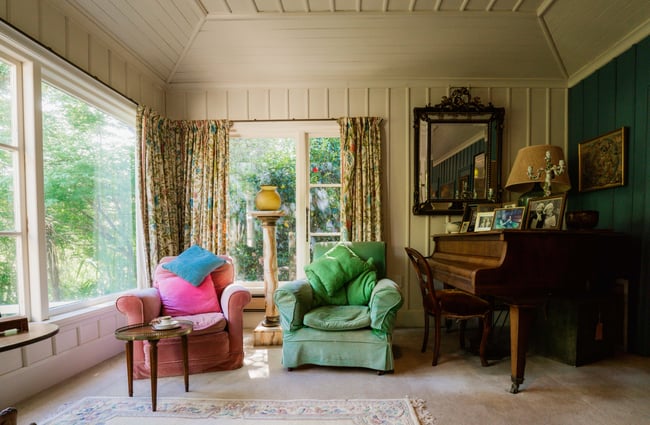 A colourful old fashioned living room.