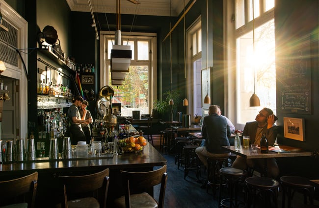 Sunlight streaming through OGB's speakeasy-style bar in Christchurch
