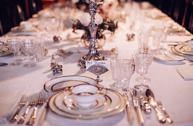 Crystal table setting on long dining table.