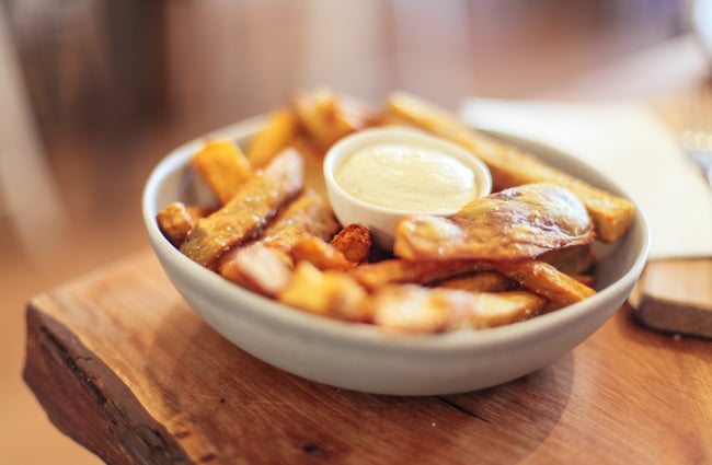 Golden fries in a bowl.