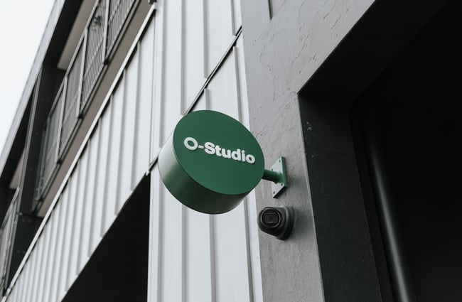 O-Studio signage on the exterior of the building.
