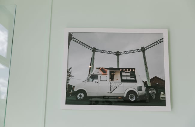 Photograph of food truck on the wall at Patti's and Cream Scoop Shop.