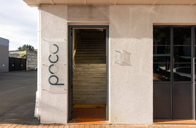 The white painted entrance to Poco's in Rotorua.