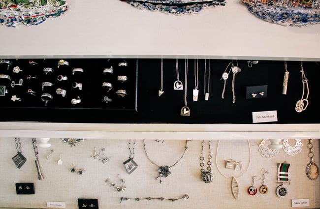 Jewellery in display cabinets.