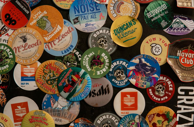 A close up of beer stickers.