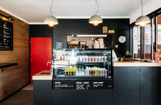 The counter and drinks fridge at Red Star, Wānaka.