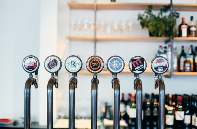 Close up of beer taps.