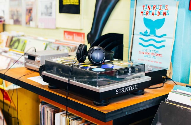Record player and headphones for listening to records at Slow Boat Records, Wellington.