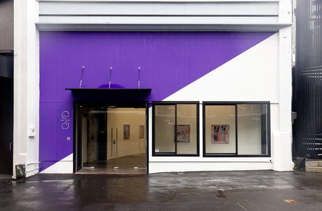 The purple and white exterior of Sumer gallery in Auckland.