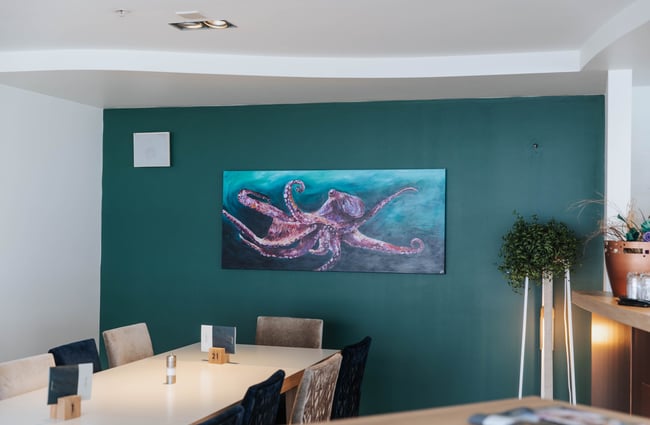 An octopus painting on a wall.