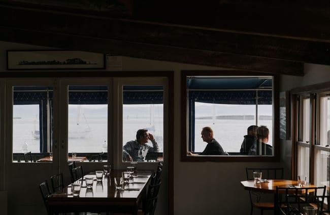 View of people dining at Boat Shed Cafe.