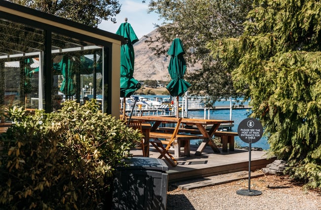 The entrance to Boat Shed Queenstown on a sunny day.