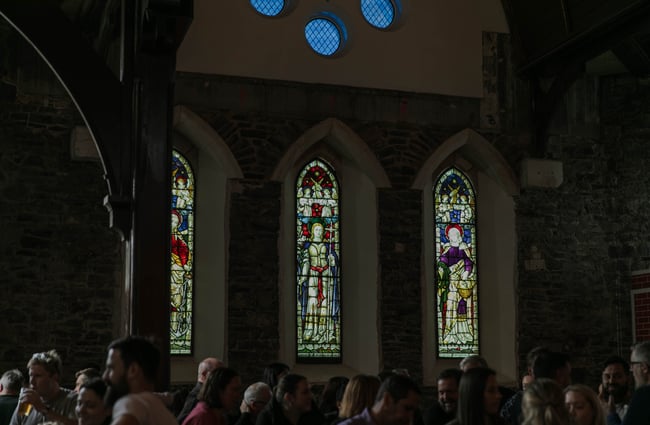 Stained glass windows on the church wall.