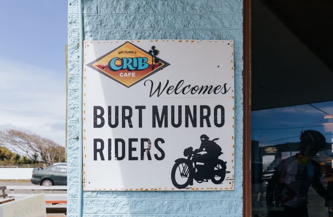 A burt munro sign on the exterior of the building.