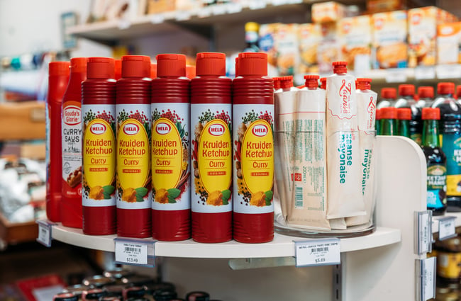 European curry ketchup on shelf in specialty Dutch food shop