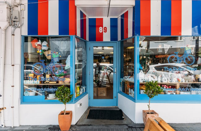 Exterior of specialty food shop painted in the red, white and blue colours of the Dutch flag