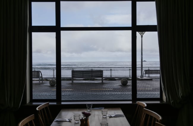 A table with the view of the esplanade.
