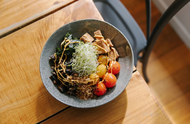 A close up of a healthy bowl of food on a tableat the Greedy Cow Café in Tekapo.