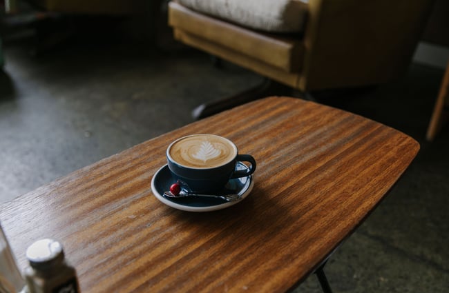 Close up of a flat white on a table at The Running Duck cafe in Geraldine.
