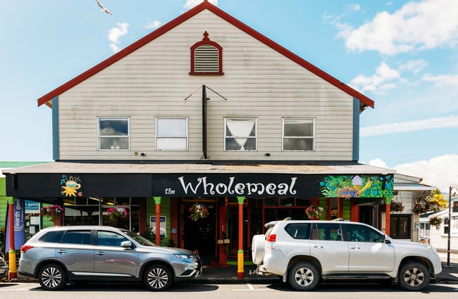 The exterior of the Wholemeal Cafe on a sunny day.
