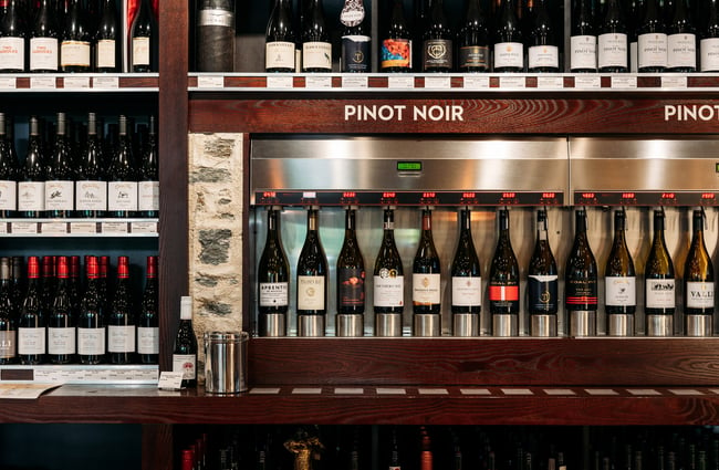 Pinot noir lined up at the bar inside The Winery Arrowtown.