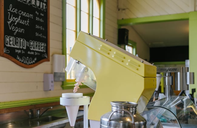 Yellow ice cream machine at Toad Hall, Motueka.