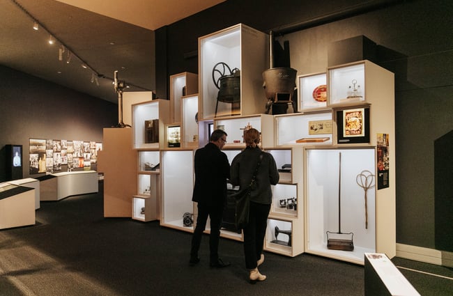 Two people browsing the exhibtion.