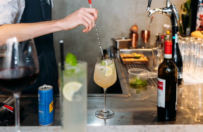 A cocktail being made behind the counter at Toreta Cucina New Plymouth.