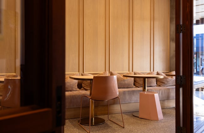 Pink, suede and wooden detailing inside Tosca in Auckland