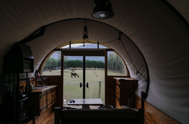 View from inside the wagon looking to the field outside.