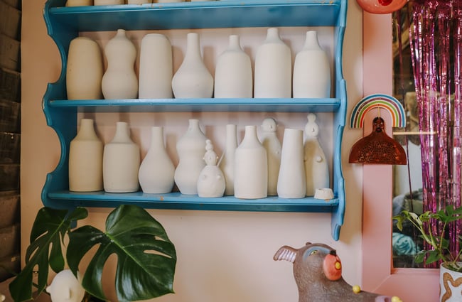 Ceramic vessels on shelves at Zappekin Artists & Allies, Nelson Tasman.