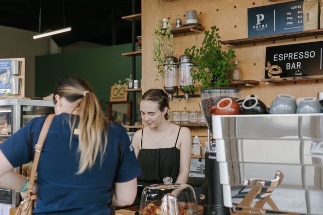 A customer being served at Prima Roastery in Christchurch.