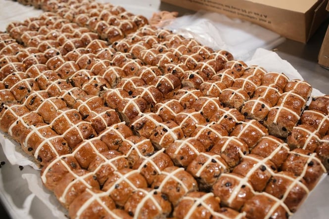 Row upon row of baked hot cross buns from Volare.