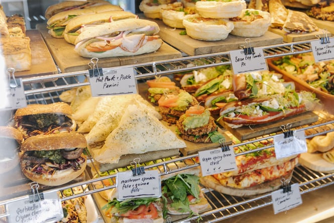 Filled sandwiches, bagels and pies in the cabinet of Switch New Brighton