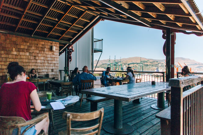 Outdoor cafe area overlooking the harbour at Lyttelton Coffee Co