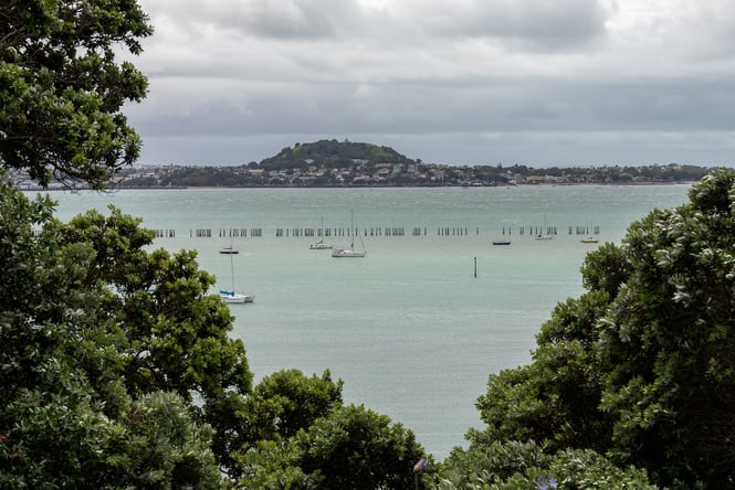 View of the ocean and mountains around Mount Victoria in Devonport, Auckland