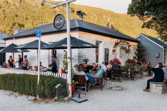 People dining outside Fork and Tap in Arrowtown.