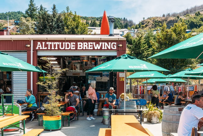 People dining at Altitude Brewing Queenstown.