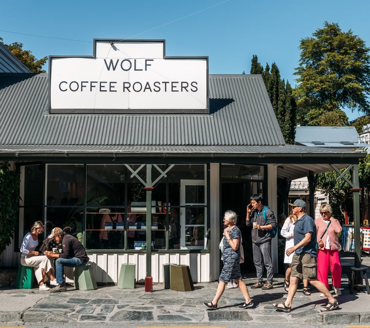 The exterior of the Wolf Coffee Roasters on a sunny day.