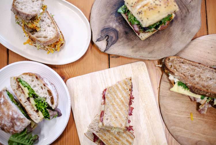 A selection of different sandwiches on a table.