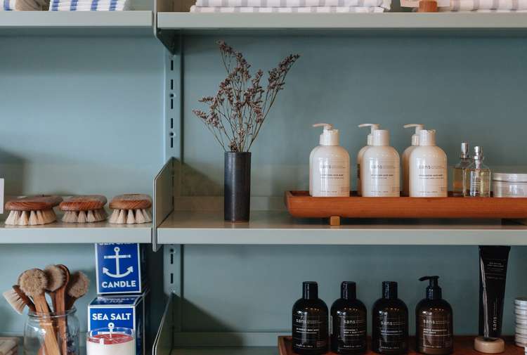 Homewares neatly displayed on shelves inside Everyday Needs in Auckland.
