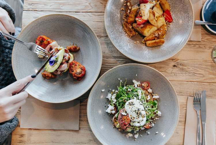 A flatlay of brunch meals on a table at The Batch in Invercargill.
