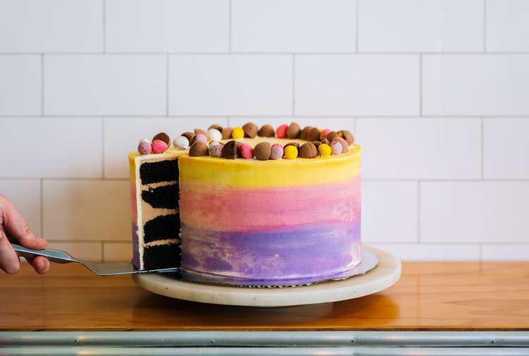 A slice of cake and a cake for Easter at Sweet Bakery and Cakery Wellington.