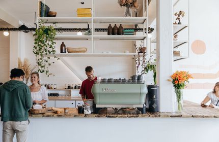 The counter and coffee machine at Ally & Sid café in Christchurch.